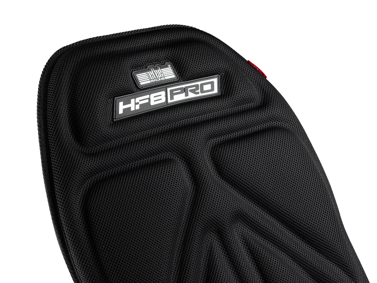 Next Level Racing HF8 Pro Haptic Feedback Pad - close-up van materiaal en HF8 PRO logo